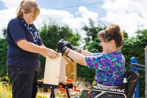 RSPCA volunteer making a bird nest.